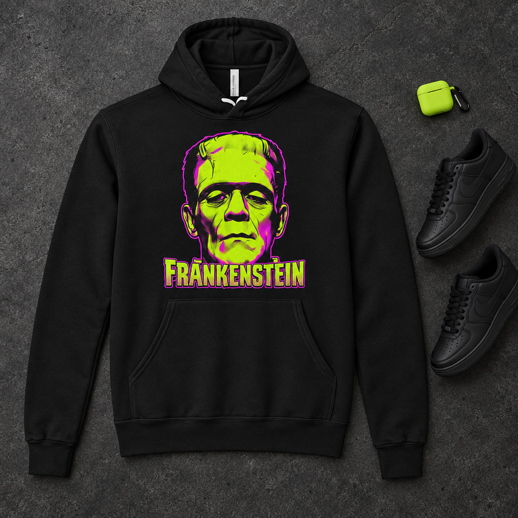 Flat lay of black Frankenstein hoodie with streetwear accessories